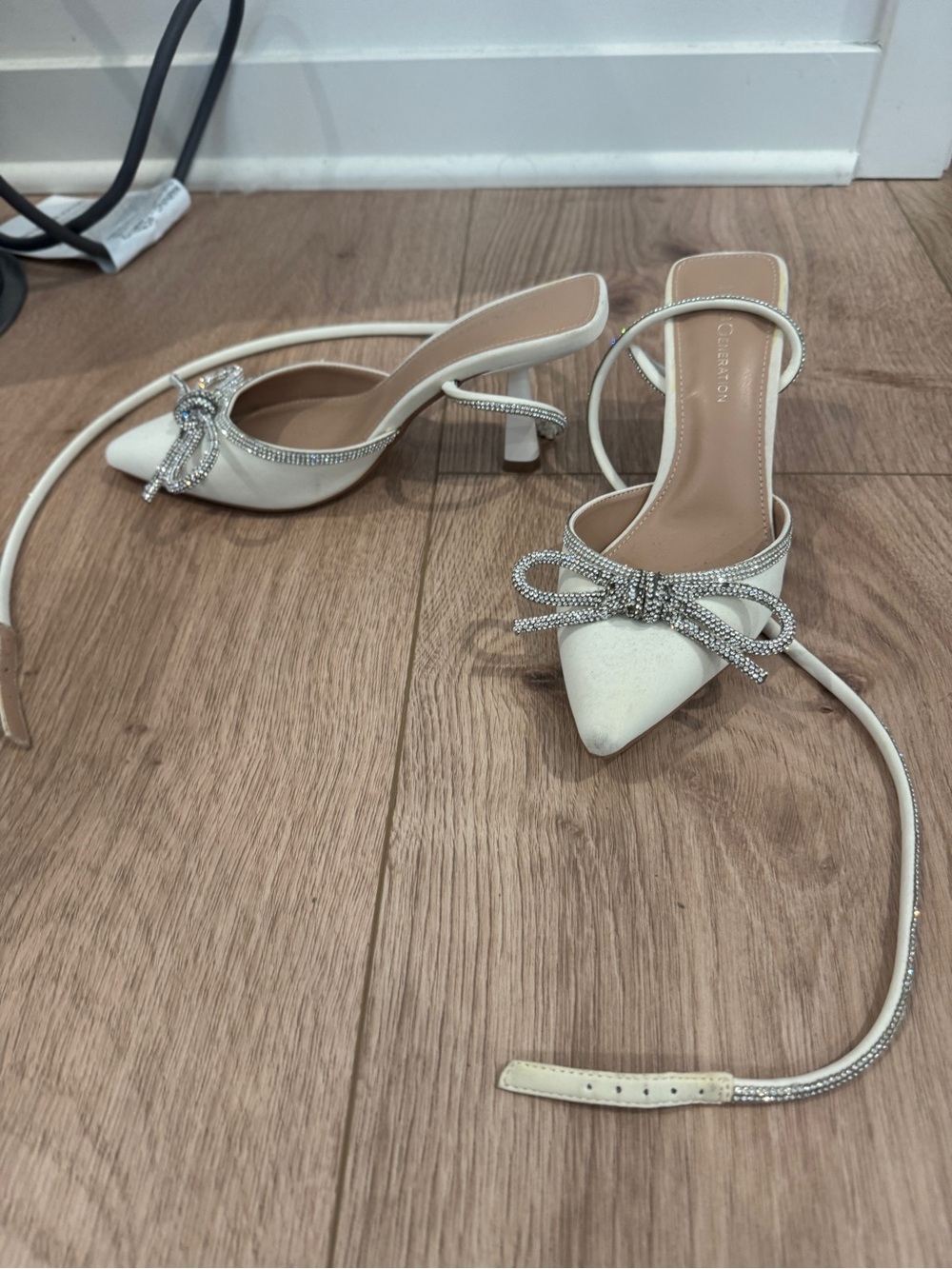 BCBGeneration Ivory Pointed Toe Crystal Bow Slingback Heels